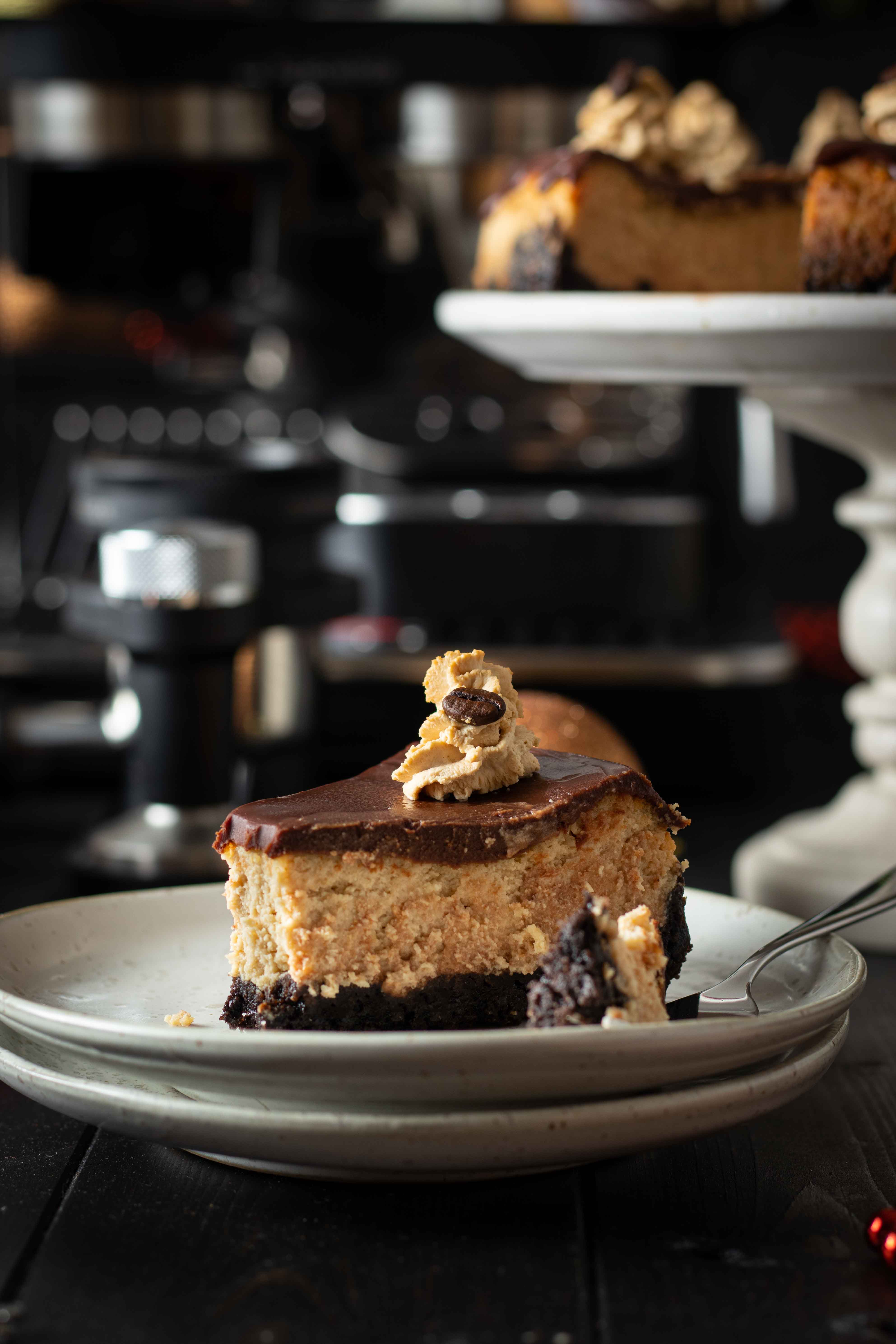 Baked coffee cheesecake with dark chocolate ganache and Mocha cream frosting